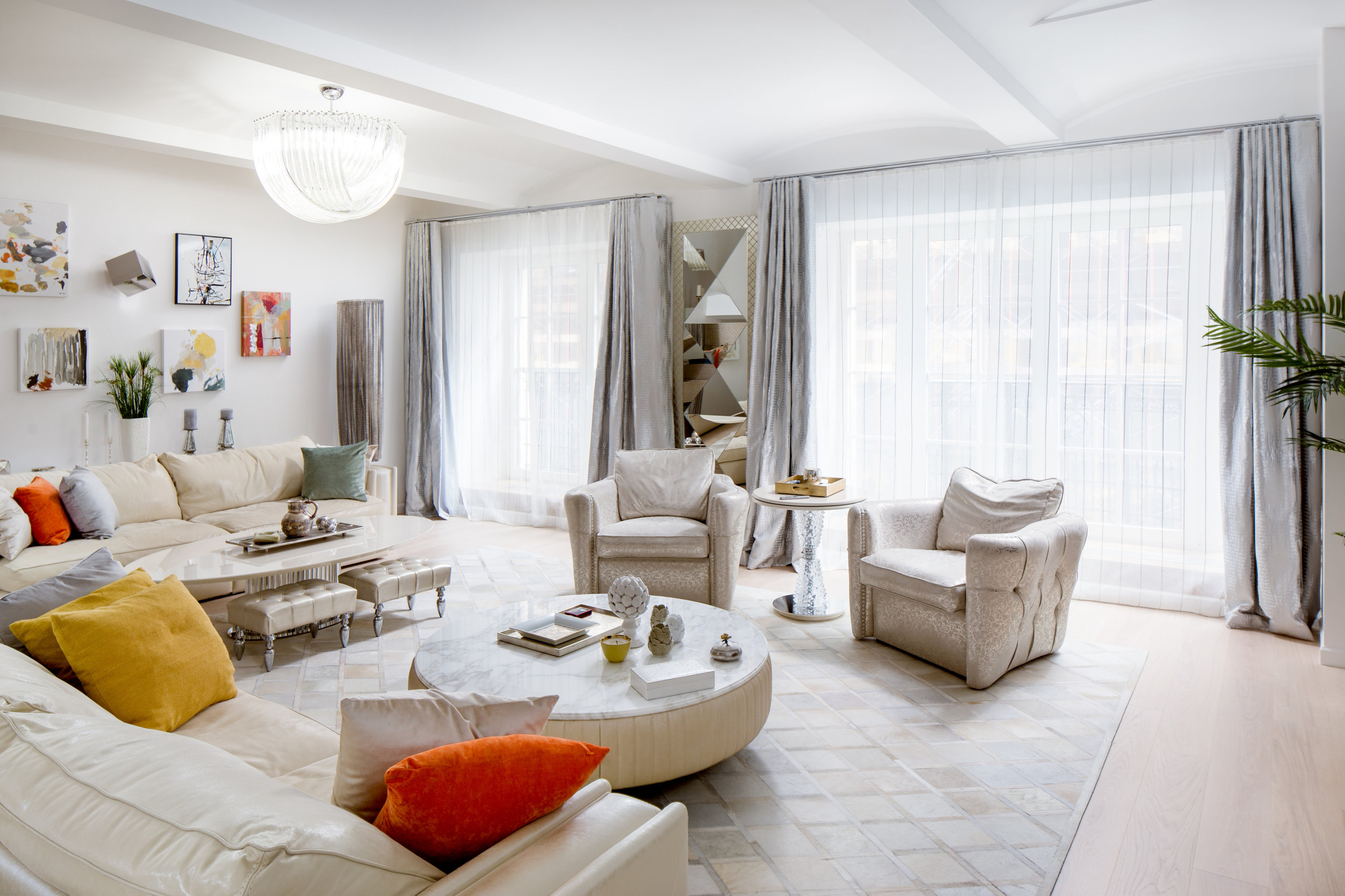 Central Park West Prewar Renovation — living room with vaulted ceiling and crystal chandeliers