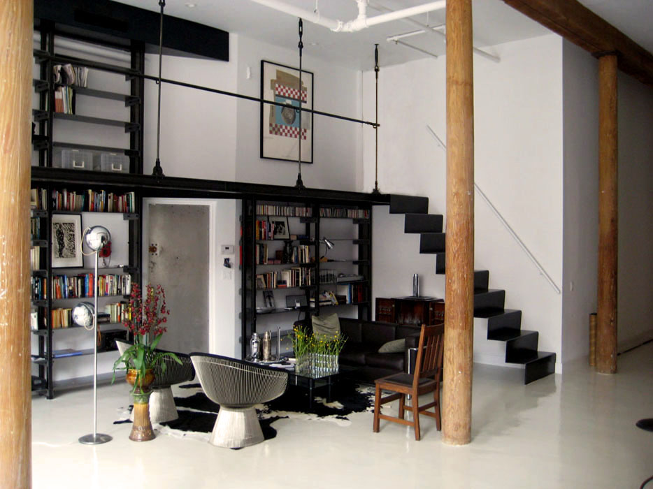 Union Square Loft Renovation — industrial living room with custom steel staircase